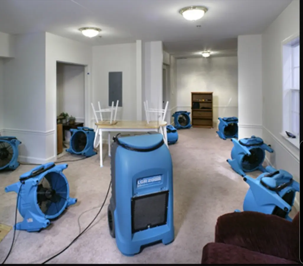 Air movers and dehumidifier setup for Water Damage Restoration in Wharton